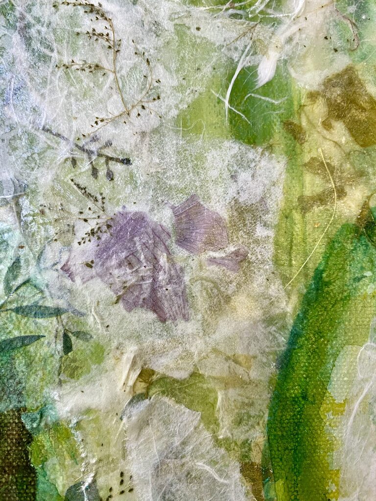 (Textured white robe composed of layered, torn handmade paper.)